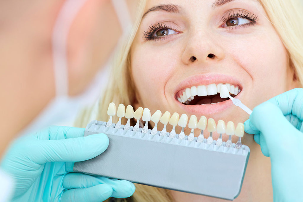 Woman having restorative dentistry treatment